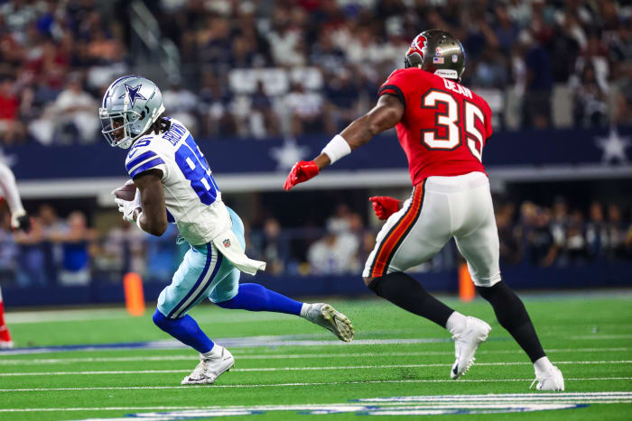 Sep 11, 2022; Arlington, Texas, USA; Dallas Cowboys wide receiver Noah Brown (85) runs with the ball as Tampa Bay Buccaneers cornerback Jamel Dean (35) defends during the first quarter at AT&T Stadium. Mandatory Credit: Kevin Jairaj-USA TODAY Sports